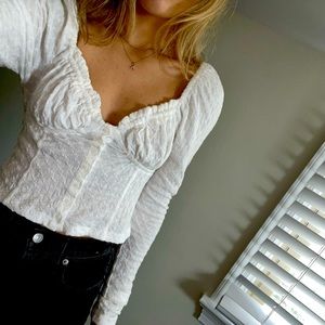 Free People white long sleeve top.
